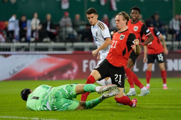 SOCCER - NL, AUT vs KOS VIENNA,AUSTRIA,27.SEP.26 - SOCCER - UEFA Nations League, OEFB international match, Länderspiel, Nationalmannschaft Austria vs Kosovo. Image shows Arijanet Muric (KOS) and Patrick Wimmer (AUT).  GEPAxpictures xKevinxKada
