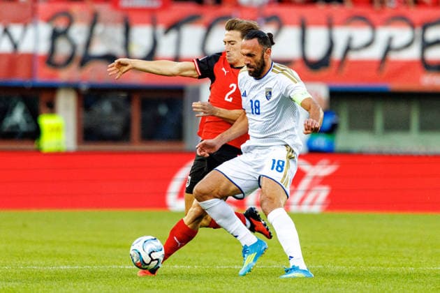 VIENNA, AUSTRIA - 27 SEPTEMBER 2026: Image shows Affengruber David (Austria, 2) and Muriqi Vedat (Kosovo, 18) during UEFA Nations League 2026 27 League B, Group B3, Matchday 2: Austria vs Kosovo at Ernst-Happel-Stadion on 27 09 2026 in Vienna, Austria. Austria Copyright: xFröhlichxPascalx