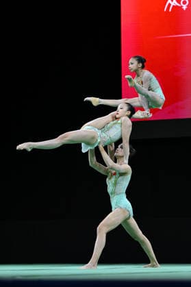 IPA89041404 - CHEN Yutong, LI Jiaxin, and LI Xiaozhen (CHN) at the 30th World Acrobatic Gymnastics Championships in Pesaro, Italy, on September 27, 2026  Copyright: xFilippoxTomasi IPAxSportx xx IPA89041404