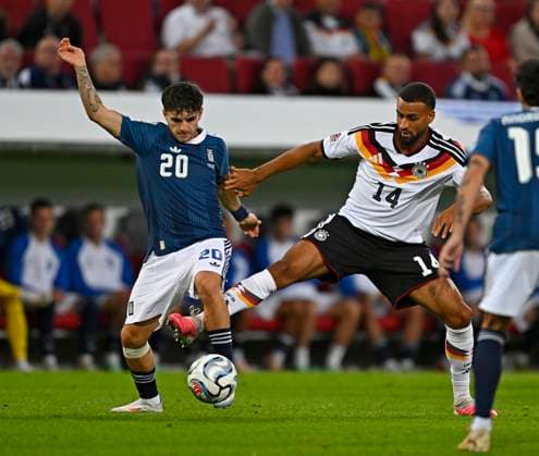 September 27, 2026, Soccer: UEFA Nations League 2026–2027, Matchday 2, Germany vs. Greece, at the WWK Arena in Augsburg; from left: Christos Zafeiris (Greece) and Josha Vagnoman (Germany)