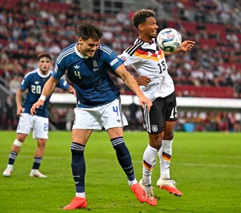 September 27, 2026, Soccer: UEFA Nations League 2026–2027, Matchday 2, Germany vs. Greece, at the WWK Arena in Augsburg, from left: Ntinos Mavropanos (Greece) vs. Bambase Conte (Germany)