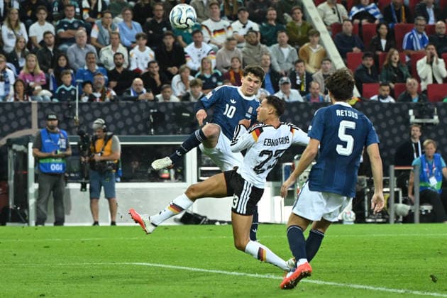 September 27, 2026, xemx, Soccer UEFA Nations League, Germany vs. Greece, Christos Tzolis (Greece), Younes Ebnoutalib, German National Soccer Team (DFB), Panagiotis Retsos (Greece), tackle, action, battle for the ball, Augsburg