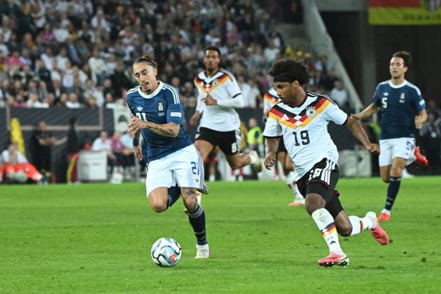 September 27, 2026, xemx, Soccer, UEFA Nations League, Germany vs. Greece, Konstantinos Tsimikas (Greece), Karim Adeyemi (German National Soccer Team, DFB), Augsburg