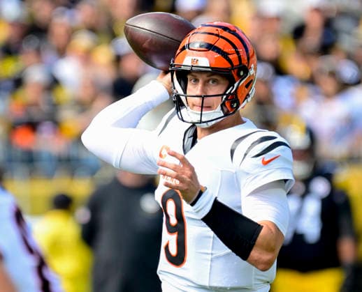 Cincinnati Bengals quarterback Joe Burrow (9) throws in the first quarter against the Pittsburgh Steelers at Acrisure Stadium on Sunday, Sept. 27, 2026 in Pittsburgh.  PIT2026092702 ARCHIExCARPENTER