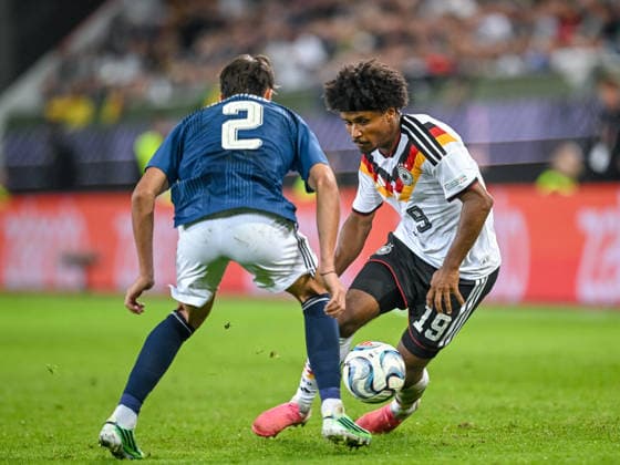 Giorgos Vagiannidis of Greece and Karim Adeyemi of Germany battle for the ball during the UEFA Nations League 2026–27 group stage match between Germany and Greece at WWK Arena on September 27, 2026, in Augsburg, Germany. Photo by Harry Langer, DeFodi Images