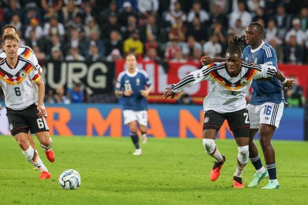 Yann Aurel Bisseck 2 (Germany) in action against Andreas Tetteh 16 (Greece), Germany vs. Greece, Soccer, DFL, DFB, UEFA Nations League, 2026–2027 season, group stage, Group B, Matchday 2 of 6, September 27, 2026, Augsburg, Bavaria, Germany Copyright: xkolbert-press MartinxAgüerax