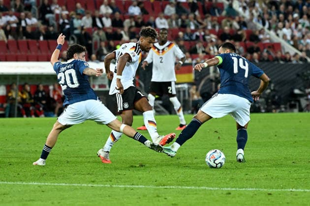 September 27, 2026, xemx, Soccer UEFA Nations League, Germany vs. Greece, Christos Zafeiris, Greece, Bambase Conte, German National Soccer Team (DFB), Vangelis Pavlidis, Greece, tackle, action, battle for the ball, Augsburg