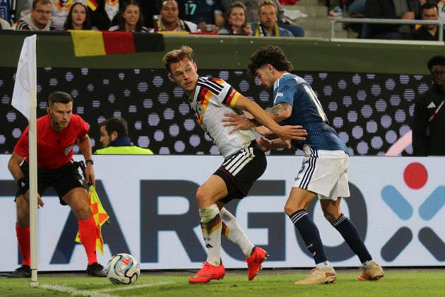 September 27, 2026 Men s Soccer 2026–2027 UEFA Nations League Matchday 2 Germany vs. Greece WWK Arena, Augsburg Joshua Kimmich (Germany), 6, in white, shields the ball from Thanasis Androutsos of Greece, 15, in blue, at the corner flag in Augsburg, Bavaria, Germany