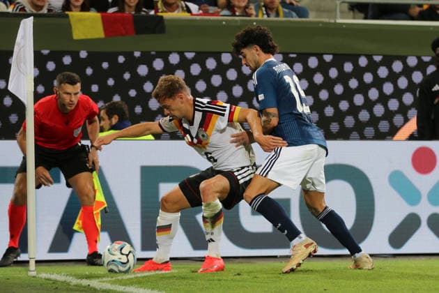 September 27, 2026 Men s Soccer 2026–2027 UEFA Nations League Matchday 2 Germany vs. Greece WWK Arena, Augsburg Joshua Kimmich (Germany), 6, in white, shields the ball from Thanasis Androutsos of Greece, 15, in blue, at the corner flag in Augsburg, Bavaria, Germany