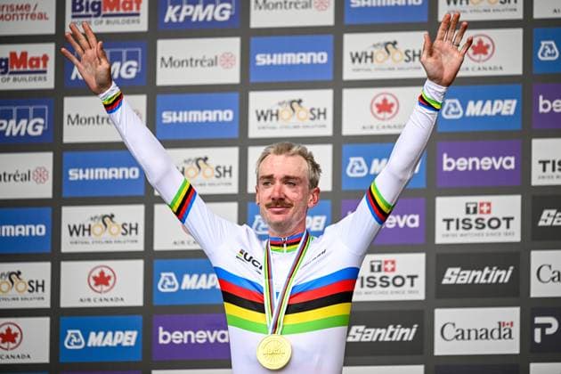 American Brandon McNulty , winner of the gold medal celebrates on the podium of the elite men Road Race race (273,7 km) at the cycling World Championship, WM, Weltmeisterschaft in Montreal, Canada, Sunday 27 September 2026. The UCI road world championships are taking place from 20 to 27 September, in Montreal, Canada. JASPERxJACOBS  x188014260x