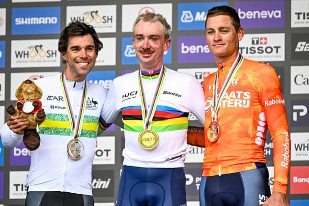 Australian Michael Matthews; American Brandon McNulty and Dutch Mathieu van der Poel pictured on the podium after the elite men Road Race race (273,7 km) at the cycling World Championship, WM, Weltmeisterschaft in Montreal, Canada, Sunday 27 September 2026. The UCI road world championships are taking place from 20 to 27 September, in Montreal, Canada. JASPERxJACOBS  x188014481x