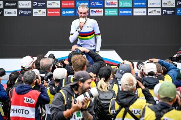 American Brandon McNulty , winner of the gold medal celebrates on the podium of the elite men Road Race race (273,7 km) at the cycling World Championship, WM, Weltmeisterschaft in Montreal, Canada, Sunday 27 September 2026. The UCI road world championships are taking place from 20 to 27 September, in Montreal, Canada. JASPERxJACOBS  x188014602x