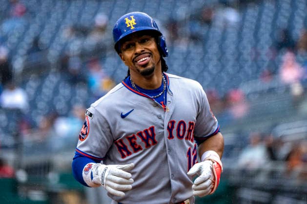 New York Mets short stop Francisco Linder (12) smiles after hitting his 300th career home run in the top of the second inning during a game against the Washington Nationals at Nationals Park in Washington, DC on Sunday, September 27, 2026.  WAP20260927313 BONNIExCASH
