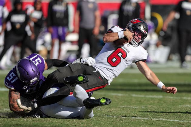 Sep 27, 2026; Tampa, FL, USA; Tampa Bay Buccaneers quarterback Baker Mayfield (6) attempts to get a first down after scrambling during an NFL, American Football Herren, USA football game between the Minnesota Vikings and Tampa Bay Buccaneers at Raymond James Stadium in Tampa, Florida. Mandatory Credit: Taylor McFee-Cal Media Tampa USA - ZUMAc04_ 20260927_zma_c04_075 Copyright: xTaylorxMcfeex