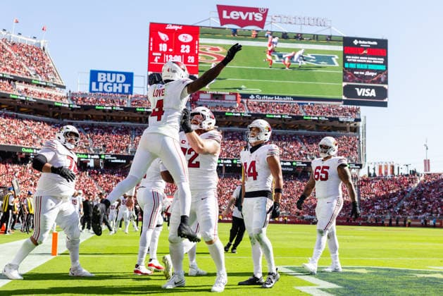 SANTA CLARA, CA - SEPTEMBER 27: Jeremiyah Love 4 of the Arizona Cardinals is lifted by Hjalte Froholdt 72 after scoring a touchdown in the fourth quarter of an NFL, American Football Herren, USA game against the San Francisco 49ers on September 27, 2026 at Levi s Stadium in Santa Clara, CA. (Photo by Matthew Huang Icon Sportswire) NFL: SEP 27 Cardinals at 49ers EDITORIAL USE ONLY Icon260927032