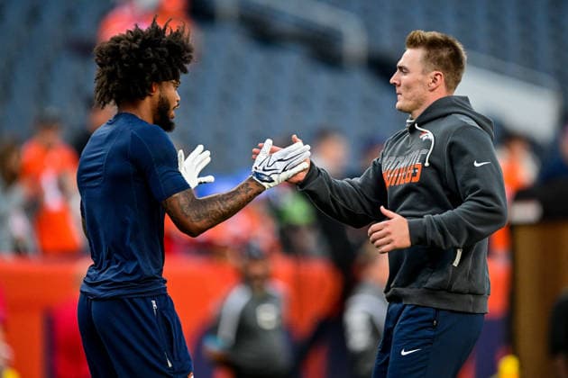 DENVER, CO - SEPTEMBER 27: Denver Broncos quarterback Bo Nix (10) greets wide receiver Troy Franklin (11) on the field as players warm up before a game between the Los Angeles Rams and the Denver Broncos at Empower Field at Mile High on September 27, 2026 in Denver, Colorado. (Photo by Dustin Bradford Icon Sportswire) NFL, American Football Herren, USA SEP 27 Rams at Broncos EDITORIAL USE ONLY Icon132260927005