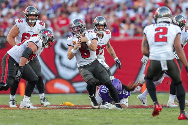 Sep 27, 2026; Tampa, FL, USA; Tampa Bay Buccaneers quarterback Baker Mayfield (6) attempts to scramble to avoid a sack by Minnesota Vikings defensive lineman Levi Drake Rodriguez (50) during an NFL, American Football Herren, USA football game between the Minnesota Vikings and Tampa Bay Buccaneers at Raymond James Stadium in Tampa, Florida. The Vikings defeated the Buccaneers 23-16. Mandatory Credit: Taylor McFee-Cal Media Tampa USA - ZUMAc04_ 20260927_zma_c04_091 Copyright: xTaylorxMcfeex
