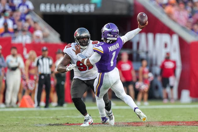 Sep 27, 2026; Tampa, FL, USA; Minnesota Vikings quarterback Kyler Murray (1) throws a pass while under pressure by Tampa Bay Buccaneers defensive lineman A Shawn Robinson (91) during an NFL, American Football Herren, USA football game between the Minnesota Vikings and Tampa Bay Buccaneers at Raymond James Stadium in Tampa, Florida. The Vikings defeated the Buccaneers 23-16. Mandatory Credit: Taylor McFee-Cal Media Tampa USA - ZUMAc04_ 20260927_zma_c04_100 Copyright: xTaylorxMcfeex
