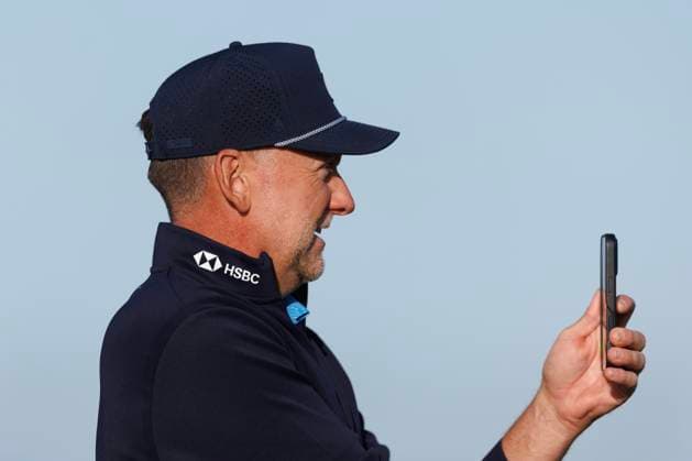 28th September 2026; The Old Course, St Andrews Links, St Andrews, Scotland; DP World Tour Golf, Alfred Dunhill Links Championship, Practice Day; Ian Poulter of England videos his playing partner with a phone on the 16th tee during a practice round DavidxYoung