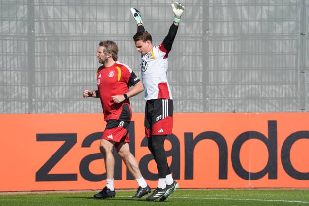 Goalie Jonas Urbig (Germany) with Goalie Coach Stefan Wessels (Germany) at HerzoBase on September 30, 2026: German National Team Nations League Preparation, Home Ground, HerzoBase, World of Adidas, Herzogenaurach