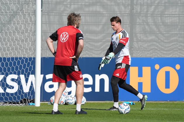 Goalie Jonas Urbig (Germany) with Goalie Coach Stefan Wessels (Germany) at HerzoBase on September 30, 2026: German National Team Nations League Preparation, Home Ground, HerzoBase, World of Adidas, Herzogenaurach