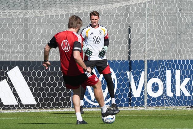 Goalie Jonas Urbig (Germany) with Goalie Coach Stefan Wessels (Germany) at HerzoBase on September 30, 2026: German National Team Nations League Preparation, Home Ground, HerzoBase, World of Adidas, Herzogenaurach