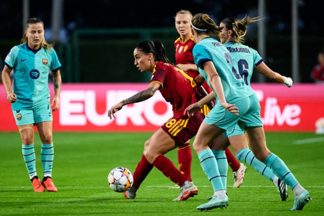 Martina Piemonte of AS Roma, Clara Serrajordi and Irene Paredes of FC Barcelona, Barca during the Women s Champions league football match between AS Roma and FC Barcelona at Tre Fontane stadium in Rome (Italy), September 30, 2026. AndreaxStaccioli