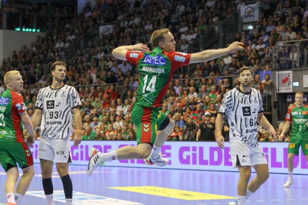 September 30, 2026, xgox, Opel HBL Handball, SC Magdeburg vs. THW Kiel emspor, from left: Omar Ingi Magnusson (Magdeburg), 14 shots on goal, goal scorer, scores a goal, Magdeburg