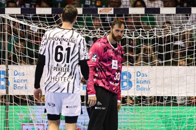 Goalkeeper Andreas Wolff (THW Kiel, 33) and Hendrik Pekeler (THW Kiel, 61), Handball Bundesliga Season 2026–2027, SC Magdeburg vs. THW Kiel at the GETEC Arena in Magdeburg; Action, Handball, Germany, September 30, 2026
