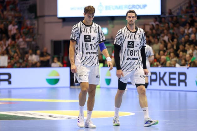 September 30, 2026, xgox, Opel HBL Handball, SC Magdeburg vs. THW Kiel, from left: Julian Köster (Kiel), 7; Hendrik Pekeler (Kiel), 61—disappointed, looking disappointed, dejected, disappointed (Magdeburg)