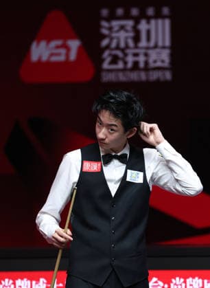 (260930) -- SHENZHEN, Sept. 30, 2026 -- Wu Yize reacts during the round 3 match between Wu Yize and Xu Si of China at World Snooker Tour Shenzhen Open 2026 in Shenzhen, south China s Guangdong Province, Sept. 30, 2026. ) (SP)CHINA-SNOOKER-SHENZHEN OPEN (CN) MaoxSiqian 
