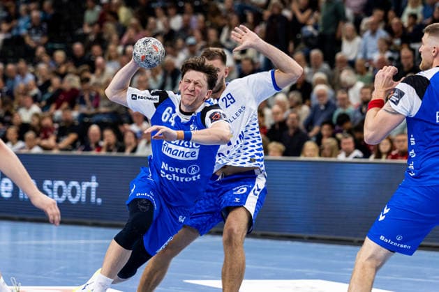 FLENSBURG, GERMANY - SEPTEMBER 30: Lasse Kjaer Moller (SG Flensburg-Handewitt, 64) against Guillermo Josà Fischer (Fraikin BM. Granollers, 29) during the EHF European League match between SG Flensburg-Handewitt vs Fraikin BM. Granollers at GGW Arena on matchday 1 of the Group Matches Group E on September 30, 2026 in Flensburg, Germany. Schleswig-Holstein Germany Copyright: xMarioxM.xKobergx