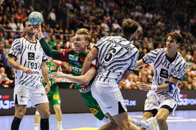 Gisli Kristjansson (SC Magdeburg, 10) vs. Harald Reinkind (M, THW Kiel, 6) and Julian Köster (THW Kiel, 7) Handball Bundesliga Season 2026–2027: SC Magdeburg vs. THW Kiel at the GETEC Arena in Magdeburg. Action, Handball,Germany, September 30, 2026