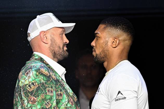 Tyson Fury and Anthony Joshua hold press conference, PK, Pressekonferenz in London before December clash LONDON, UNITED KINGDOM - SEPTEMBER 30: British heavyweight boxers Tyson Fury (L) and Anthony Joshua (R) hold a press conference at the British Airways ARC at Olympia ahead of their bout on December 11 at Principality Stadium in Cardiff, in London, United Kingdom on September 30, 2026. Rasid Necati Aslim Anadolu London United Kingdom. Editorial use only. Please get in touch for any other usage.  Copyright: x2026xAnadoluxRasidxNecatixAslimx