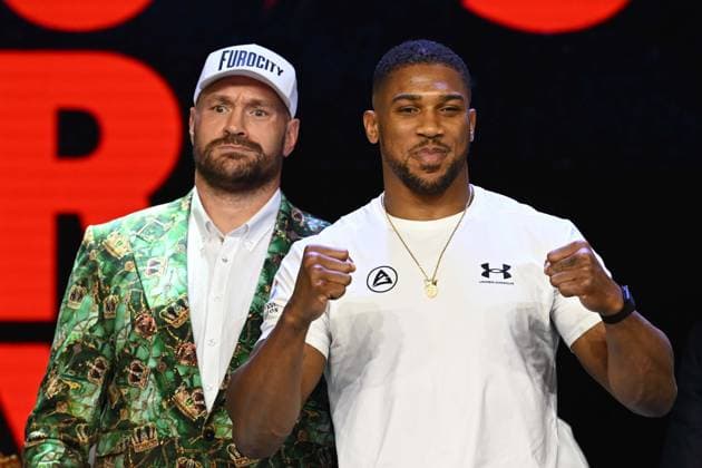Tyson Fury and Anthony Joshua hold press conference, PK, Pressekonferenz in London before December clash LONDON, UNITED KINGDOM - SEPTEMBER 30: British heavyweight boxers Tyson Fury (L) and Anthony Joshua (R) attend a press conference at British Airways ARC, Olympia ahead of their December 11 fight at Principality Stadium in Cardiff, in London, United Kingdom, on September 30, 2026. Rasid Necati Aslim Anadolu London United Kingdom. Editorial use only. Please get in touch for any other usage.  Copyright: x2026xAnadoluxRasidxNecatixAslimx