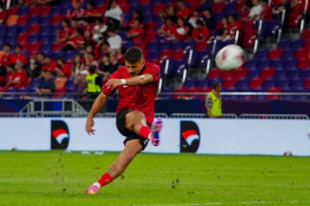 HONG KONG-SPORTS ASEAN-CUP Players of Hong Kong, China conduct stretching and passing drills on the pitch during their pre-match warm-up session ahead of the FIFA ASEAN Cup Tier 2 encounter against Brunei at Kai Tak Stadium on September 30, 2026 in Hong Kong. (Photo by Zulu Lo TMHK via Nexpher Images) Hong Kong
