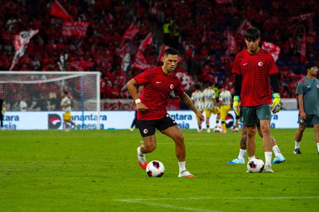 HONG KONG-SPORTS ASEAN-CUP Players of Hong Kong, China conduct stretching and passing drills on the pitch during their pre-match warm-up session ahead of the FIFA ASEAN Cup Tier 2 encounter against Brunei at Kai Tak Stadium on September 30, 2026 in Hong Kong. (Photo by Zulu Lo TMHK via Nexpher Images) Hong Kong