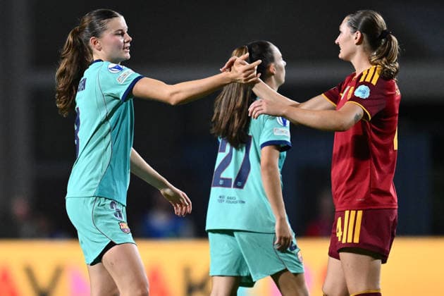 IPA89157807 - Renee van Asten of F.C. Barcelona and Winonah Heatley of A.S. Roma Femminile at the end of Matchday 2 of the 2026 27 UEFA Women s Champions League group stage, a soccer match played between A.S. Roma and F.C. Barcelona at the Tre Fontane Stadium on September 30, 2026, in Rome, Italy.  Copyright: xDomenicoxCippitelli IPAxSportx xx IPA89157807