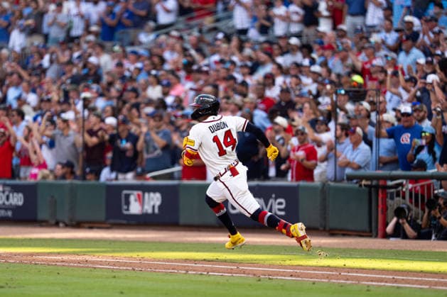 Mauricio Dubón 14 of the Atlanta Braves running the bases after a hit in the ninth inning against the Philadelphia Phillies in game two of the MLB, Baseball Herren, USA National League Wild Card round at Truist Park on Wednesday, September 30, 2026 in Atlanta, Georgia.  ATL20260930141 STEVENxBURROUGHS