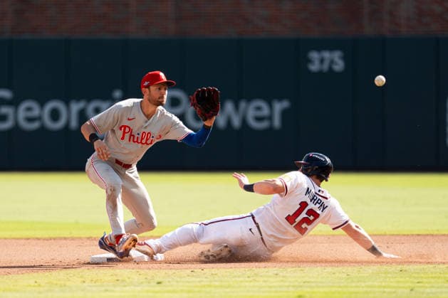 Sean Murphy 12 of the Atlanta Braves sliding into second base in the seventh inning against the Philadelphia Phillies in game two of the MLB, Baseball Herren, USA National League Wild Card round at Truist Park on Wednesday, September 30, 2026 in Atlanta, Georgia.  ATL20260930109 STEVENxBURROUGHS