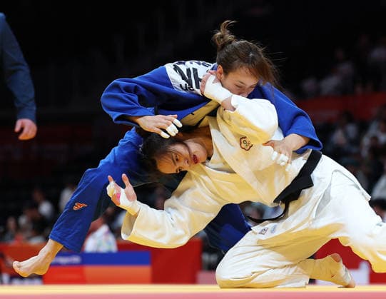 (261001) -- NAGOYA, Oct. 1, 2026 -- Zhang Wen (top) of China competes with Yuan Pei-chun of Chinese Taipei during the women -63kg elimination round of 16 of Judo at the 20th Asian Games Aichi-Nagoya 2026 in Nagoya, Japan, Oct. 1, 2026. ) (SP)JAPAN-NAGOYA-ASIAN GAMES-JUDO-WOMEN -63KG YaoxQilin 