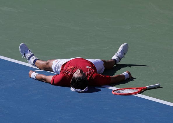(261001) -- NAGOYA, Oct. 1, 2026 -- Wu Yibing of China celebrates after the men s singles quarterfinals of tennis against Sumit Nagal of India at the 20th Asian Games Aichi-Nagoya 2026 in Nagoya, Japan, Oct. 1, 2026. ) (SP)JAPAN-NAGOYA-ASIAN GAMES-TENNIS-MEN S SINGLES LixBo 