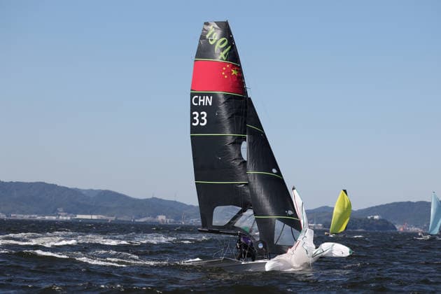 (261001) -- GAMAGORI, Oct. 1, 2026 -- Liu Tian and Wen Zaiding of China compete during the Men s Skiff Opening Series Race of Sailing at the 20th Asian Games Aichi-Nagoya 2026 in Gamagori of Aichi Prefecture, Japan, Oct. 1, 2026. ) (SP)JAPAN-GAMARORI-ASIAN GAMES-SAILING-MEN S SKIFF DengxHua 