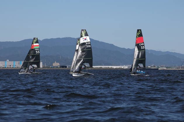 (261001) -- GAMAGORI, Oct. 1, 2026 -- Sailors prepare ahead of the Men s Skiff Opening Series Race of Sailing at the 20th Asian Games Aichi-Nagoya 2026 in Gamagori of Aichi Prefecture, Japan, Oct. 1, 2026. ) (SP)JAPAN-GAMAGORI-ASIAN GAMES-SAILING-MEN S SKIFF DengxHua