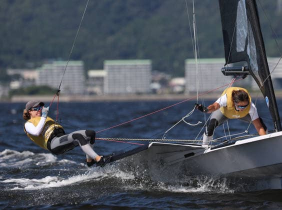 (261001) -- GAMAGORI, Oct. 1, 2026 -- Mak Hiu Tung Tiffany and Emily Grace Polson (L) of China s Hong Kong compete during the Women s Skiff Opening Series Race of Sailing at the 20th Asian Games Aichi-Nagoya 2026 in Gamagori of Aichi Prefecture, Japan, Oct. 1, 2026. ) (SP)JAPAN-GAMAGORI-ASIAN GAMES-SAILING-WOMEN S SKIFF DengxHua