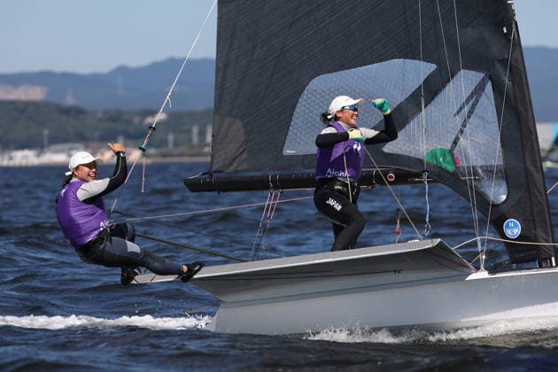 (261001) -- GAMAGORI, Oct. 1, 2026 -- Tanaka Misaki (R) and Nagamatsu Sera of Japan celebrate after winning the Women s Skiff Opening Series Race of Sailing at the 20th Asian Games Aichi-Nagoya 2026 in Gamagori of Aichi Prefecture, Japan, Oct. 1, 2026. ) (SP)JAPAN-GAMAGORI-ASIAN GAMES-SAILING-WOMEN S SKIFF DengxHua