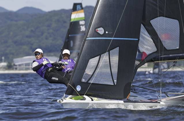 Aichi-Nagoya Asian Games: Sailing Japanese sailors Misaki Tanaka (R) and Sera Nagamatsu compete en route to winning gold in the Aichi-Nagoya Asian Games women s skiff at Kaiyoh Yacht Harbor in Gamagori in Aichi Prefecture, central Japan, on Oct. 1, 2026. A14AA0005629598P