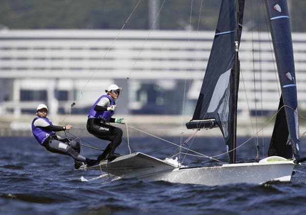 Aichi-Nagoya Asian Games: Sailing Japanese sailors Misaki Tanaka (L) and Sera Nagamatsu compete en route to winning gold in the Aichi-Nagoya Asian Games women s skiff at Kaiyoh Yacht Harbor in Gamagori in Aichi Prefecture, central Japan, on Oct. 1, 2026. A14AA0005629599P