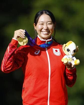 Aichi-Nagoya Asian Games: Canoe Slalom Japan s Kurumi Ito poses after winning gold in the Aichi-Nagoya Asian Games women s kayak single at Yahagigawa Canoe Slalom Course in Toyota in Aichi Prefecture, central Japan, on Oct. 1, 2026.  A14AA0005629606P