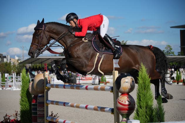 (261001) -- TOKYO, Oct. 1, 2026 -- Sato Eiken of team Japan competes during the jumping team final of equestrian at the 20th Asian Games Aichi-Nagoya 2026 in Tokyo, Japan, Oct. 1, 2026. (Photo by Xinhua) (SP)JAPAN-TOKYO-ASIAN GAMES-EQUESTRIAN-JUMPING TEAM-FINAL WangxShen 
